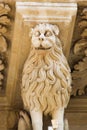 Lion statue at the Santa Croce baroque church in Lecce Royalty Free Stock Photo