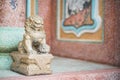 Lion statue. Chinese lion guardian statue in front of the main entrance at Chinese temple. Copy space