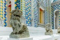 Lion statue in Chinese style in the Thai temple in the royal grand palace Royalty Free Stock Photo