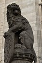 Lion statue with coat of arms Royalty Free Stock Photo