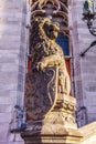 Lion statue with coat of arms shield. Royalty Free Stock Photo