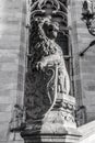 Lion statue with coat of arms shield. Black-white photo Royalty Free Stock Photo