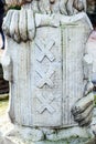 Lion statue with coat of arms shield. Royalty Free Stock Photo