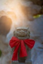 Lion statue in front of chinese temple on blurred background, Chinese New Year concept Royalty Free Stock Photo