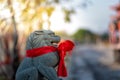 Lion statue in front of chinese temple on blurred background, Chinese New Year concept Royalty Free Stock Photo