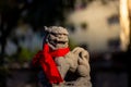 Lion statue in front of chinese temple on blurred background, Chinese New Year concept Royalty Free Stock Photo