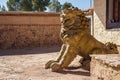 Lion statue guarding the entrance of a temple Royalty Free Stock Photo