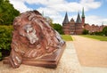 Lion statue and Holstein Gate at Lubeck Royalty Free Stock Photo