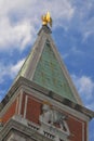 Lion statue in Piazza San Marco on blue sky background, Venice, Italy. This place is a tourist attraction of the city of Venice. Royalty Free Stock Photo