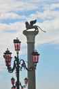 Lion statue in Piazza San Marco on blue sky background, Venice, Italy. This place is a tourist attraction o Royalty Free Stock Photo