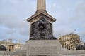 A lion statue in Trafalgar Square, London, UK Royalty Free Stock Photo