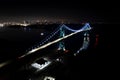 Lions Gate Bridge aerial hyperlapse, night, car light trails, traffic, Vancouver, BC, Canada. Royalty Free Stock Photo