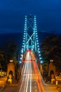 Lions Gate bridge illuminated at night in Vancouver, British Columbia Canada