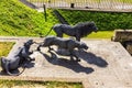 Lions made from wire mesh by Kendra Haste at the at the bottom of a dried-up moat in front of the Middle Tower. Tower of London.