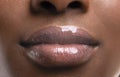 Perfect plump lips of black woman after filler injections Royalty Free Stock Photo