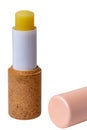 Lip balms. Close-up of a pink brown lip care stick or chapstick isolated on a white background. Macro. Cosmetics for face. Concept