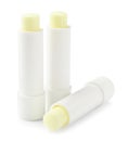 Lip balms isolated on white. Cosmetic product Royalty Free Stock Photo