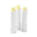 Lip balms isolated on white. Cosmetic product Royalty Free Stock Photo
