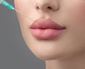 Lip filler injections. Fillers. Lip augmentation Beautiful Perfect Lips with hyaluronic acid. Sexy Mouth close-up. Beauty lips