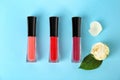 Lip glosses and flowers