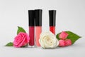 Lip glosses and flowers