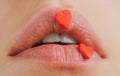 Lip with hearts. Love concept. Hearts sweet makeup. Beauty lovely lips. Lipscare.