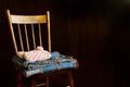 Slippers and Quilt folded neatly on Grandma`s Chair Royalty Free Stock Photo