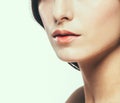 Lips. Beauty Woman face Portrait. Beautiful model Girl with Perfect Fresh Clean Skin. Youth and Skin Care Concept. Royalty Free Stock Photo