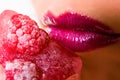 Lips and ice with raspberry