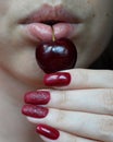 Parted plump lips with berry black cherry Royalty Free Stock Photo