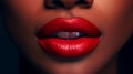 Lips with red lipstick and white teeth of a beautiful, elegant, sexy white woman with perfect skin, close-up.