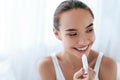 Lips Skin Care. Beautiful Woman Applying Lip Balm. Beauty Royalty Free Stock Photo