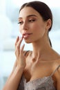 Lips Skin Care. Woman With Beauty Face Applying Lip Balm On Royalty Free Stock Photo