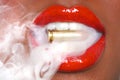 Lips of a Woman With A Bullet and Smoke Royalty Free Stock Photo