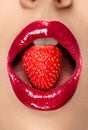 Lips. Woman With Red Lipstick And Strawberry Royalty Free Stock Photo