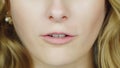 The lips of a young woman pronounce the English words - English Phonetics. To count from one to ten English