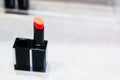 The lipstick in the black suqare shape container Royalty Free Stock Photo