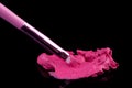 Lipstick with a brush make-up on black Royalty Free Stock Photo