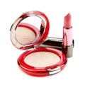 Lipstick and compact powder Royalty Free Stock Photo
