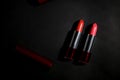 Lipstick. Fashion Colorful Lipsticks over black background. Lipstick tints palette, Professional Makeup and Beauty. Beautiful Make Royalty Free Stock Photo