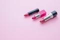 Lipstick. Fashion Colorful Lipsticks over pink background. Lipstick tints palette, Professional Makeup and Beauty Royalty Free Stock Photo