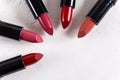 Lipstick. Fashion Colorful Lipsticks over white background. Lipstick tints palette, Professional Makeup and Beauty. Beautiful Make Royalty Free Stock Photo