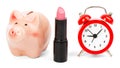 Lipstick with piggy bank on white