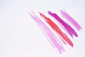 Lipstick stroke concept. Collection of smudged lipsticks isolated on white. Lipstick for professional make up. Lip care