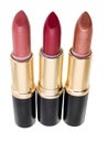 Lipstick trio isolated on white background Royalty Free Stock Photo