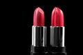 Lipsticks. Fashion red Colorful Lipstick isolated on black background Royalty Free Stock Photo
