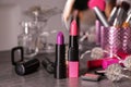 Lipsticks and other cosmetics on table Royalty Free Stock Photo