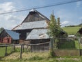 Liptovska luzna, Low Tatras, Slovakia, August 30, 2020: Old shabby log cabin cottage, timbered rural house with rusty