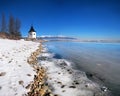 The Liptovska Mara lake frozen with ice