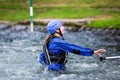 Liptovsky Mikulas / Slovakia - June 22, 2019: young girl with life jacket in water at rafting training center